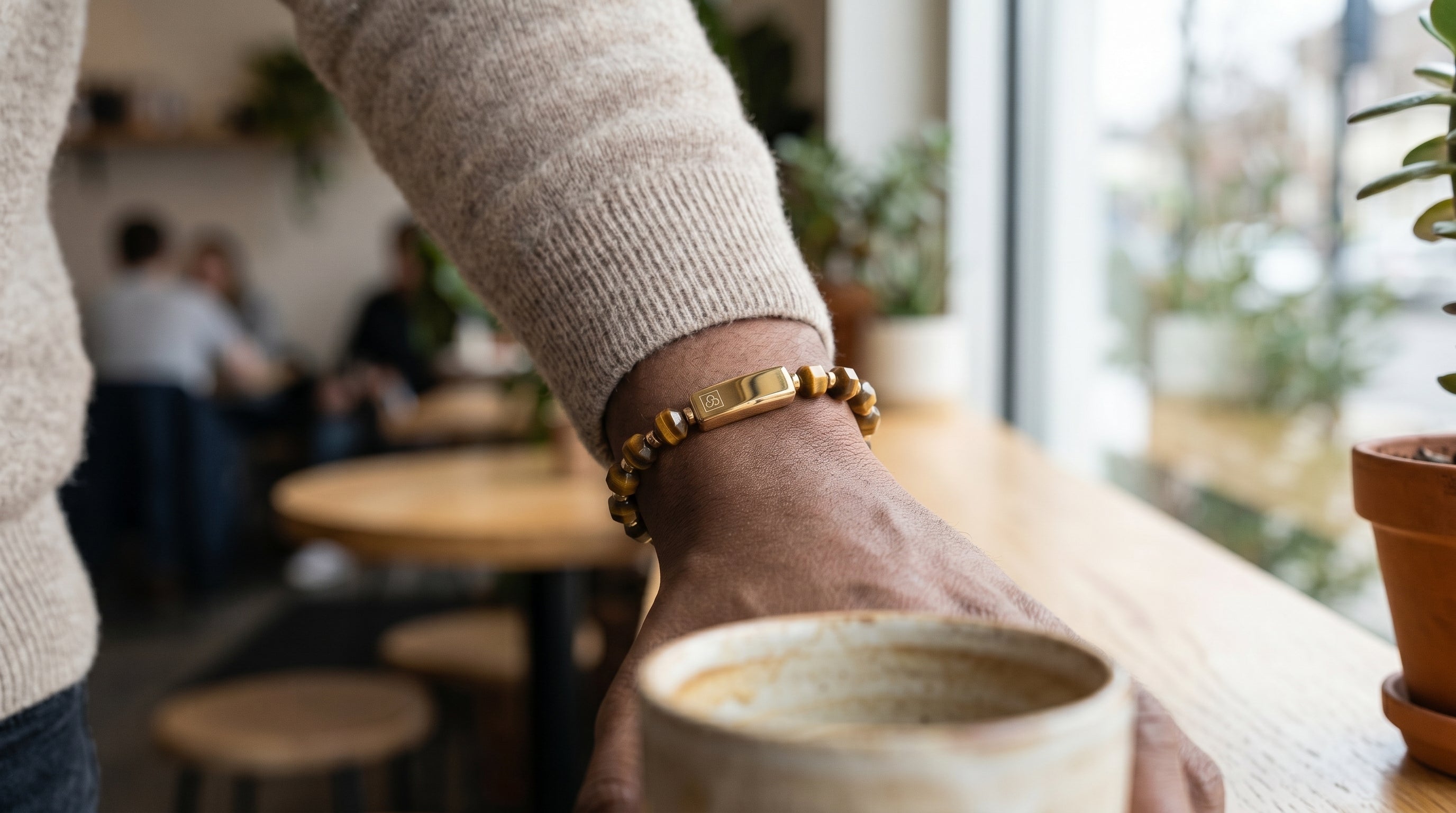 Man wearing Seekers men's bracelets