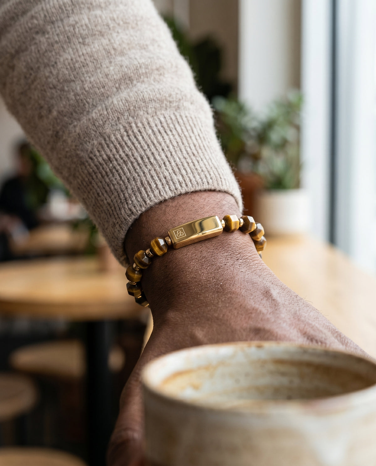 Man wearing Seekers men's bracelets